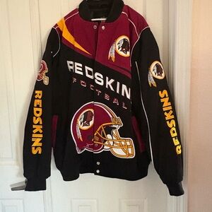 Washington Redskins Black and Red Jacket with quilted lining and logos.